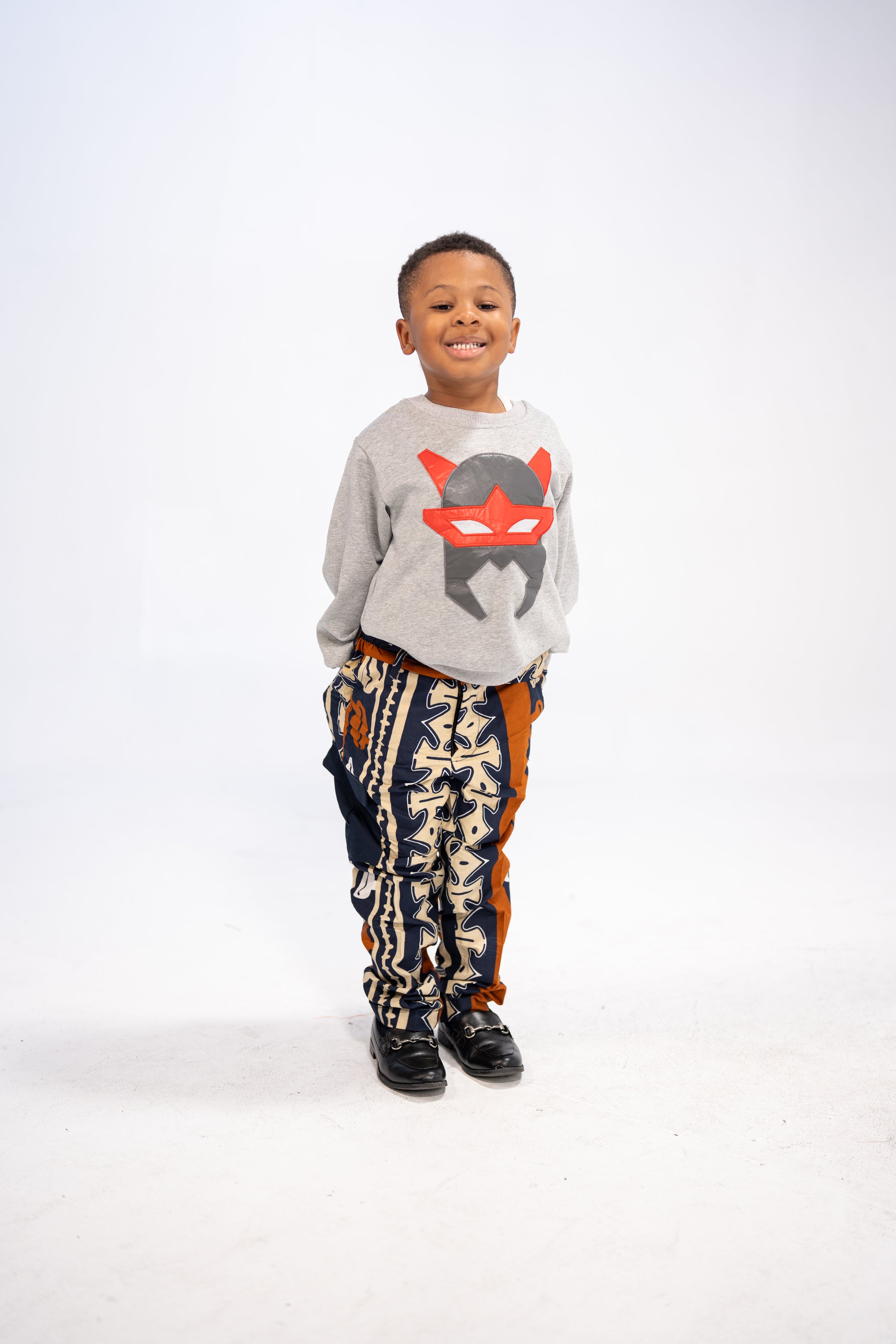 Tolani Kid's African Print Trousers (Brown Navy Abstract)