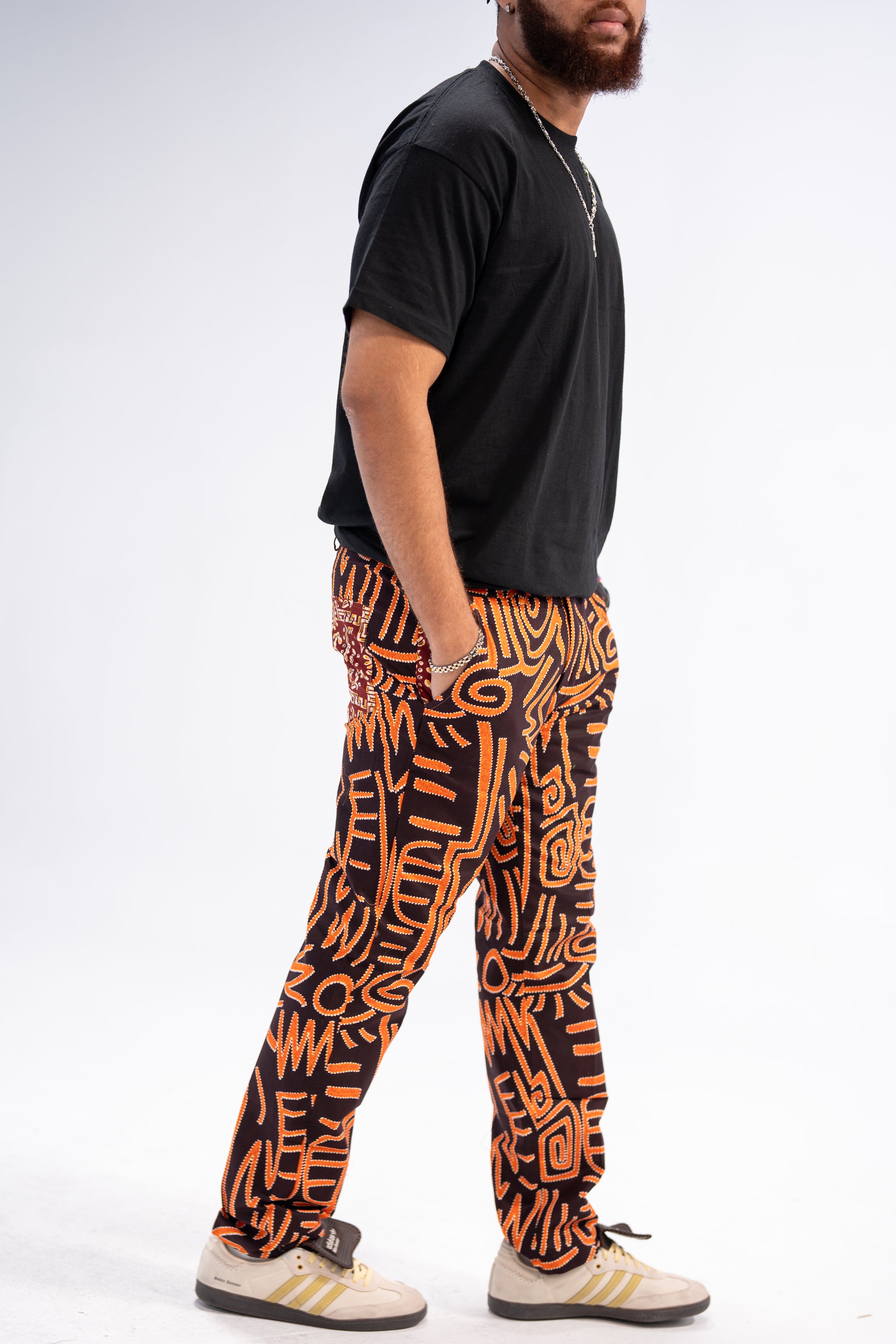 Kwame Men's African Print Trousers (Black Orange Geometric)